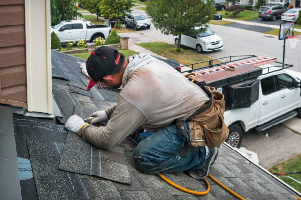 Professional Roofing technician working in Hart, TX
